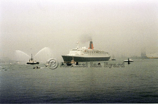 QE2 with Fireboat giving Water salute
